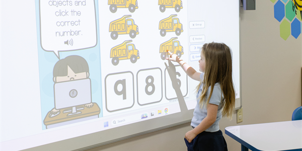Children learning together with a SMART Table at Gateway Preschool